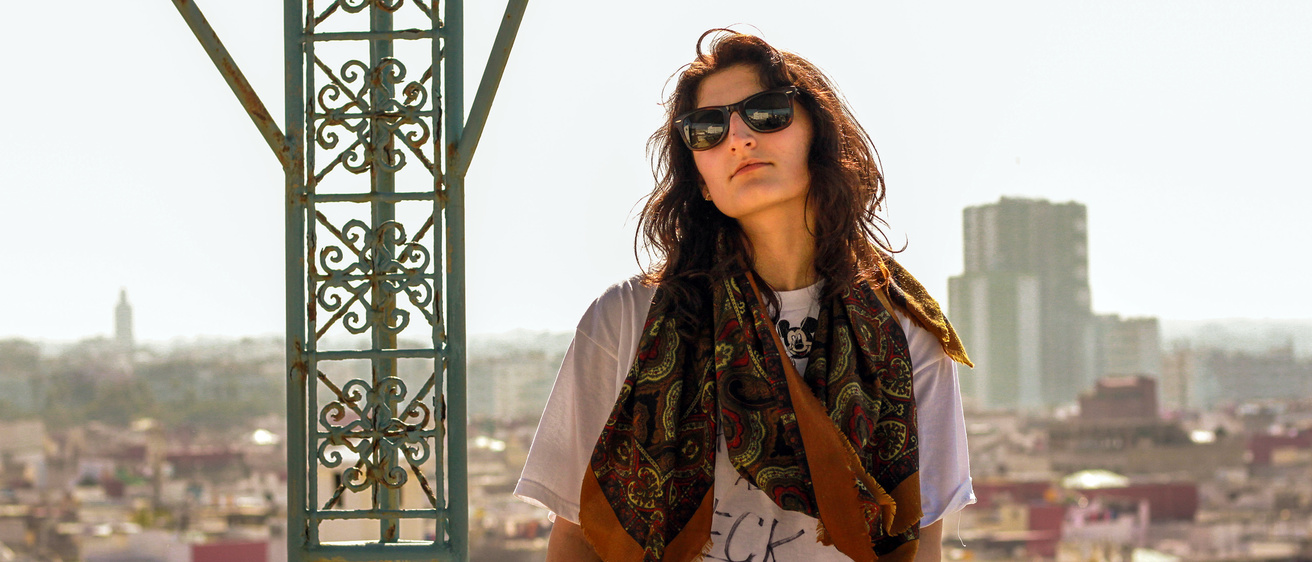 International Studies student Arlinda Fasliu on a balcony in Jordan.